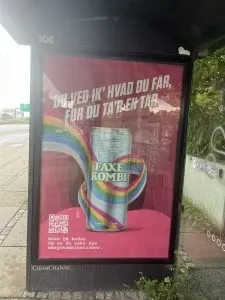Bus stop poster for Faxe Kondi with a QR code inviting people to scan