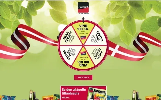 Fleggaard spin-the-wheel game with DKK 100 prizes and Danish flag ribbons